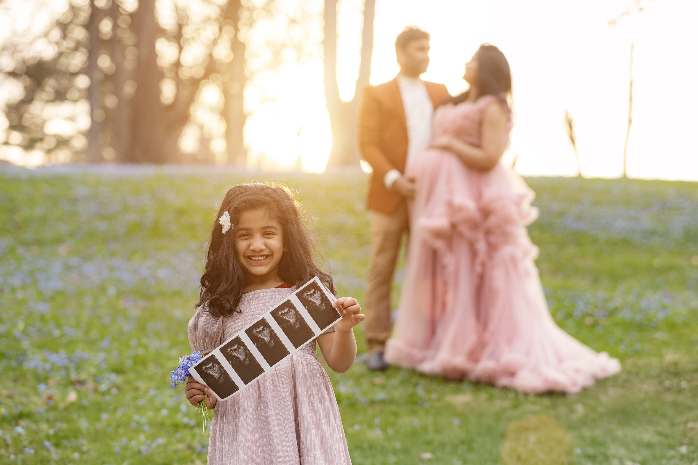 Family maternity session at golden hour with big sister